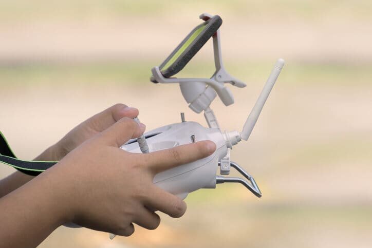 drone flying hands